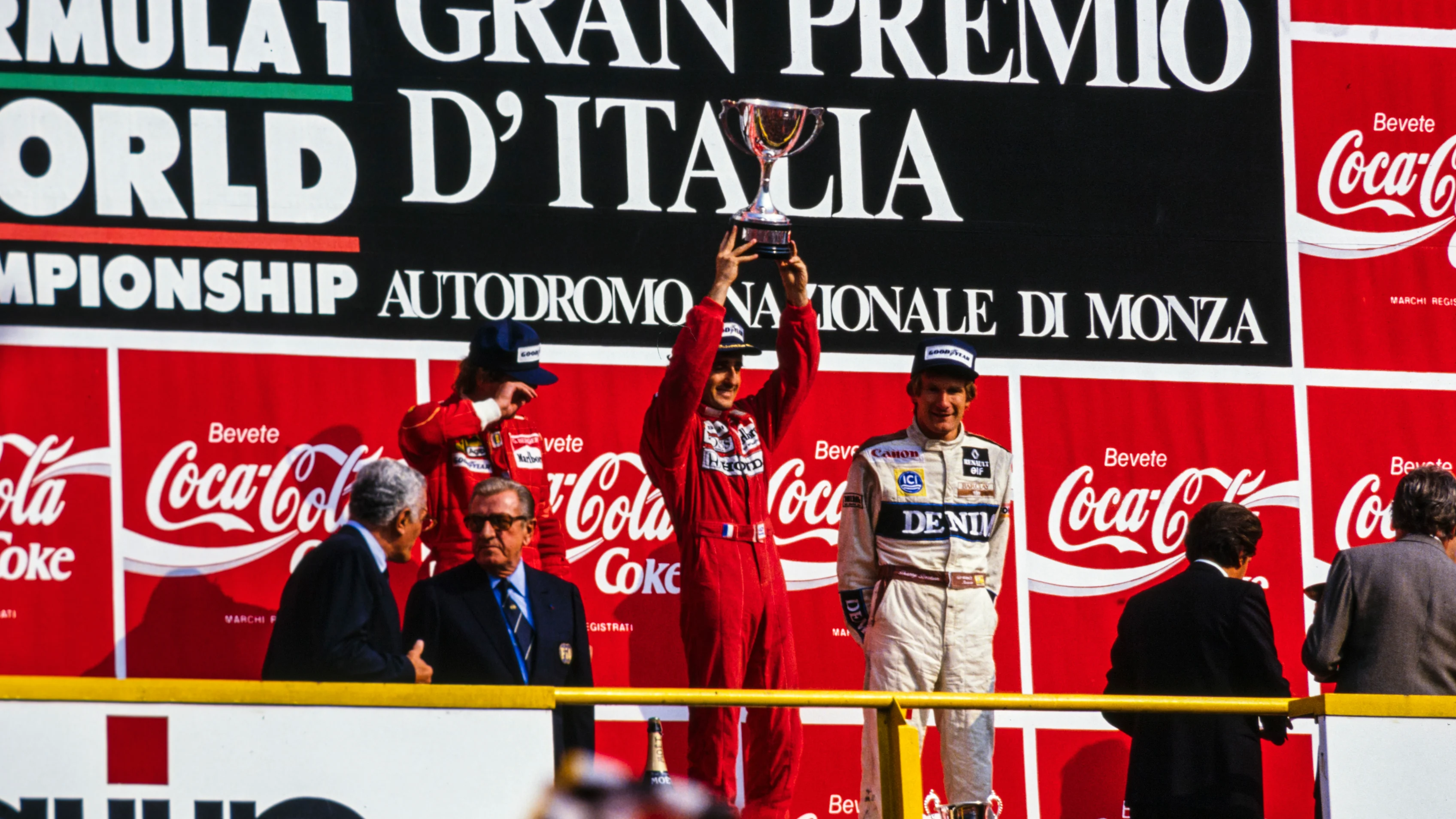 AUTODROMO NAZIONALE MONZA, ITALY - SEPTEMBER 10: Alain Prost, 1st position, raises the trophy 